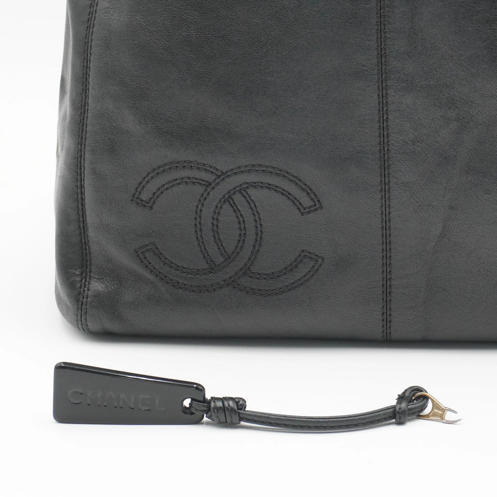CHANEL Black Leather Hobo Bag with Coco Logo CHANEL