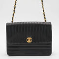 CHANEL Vintage Mademoiselle Vertical Quilted Shoulder Bag CHANEL